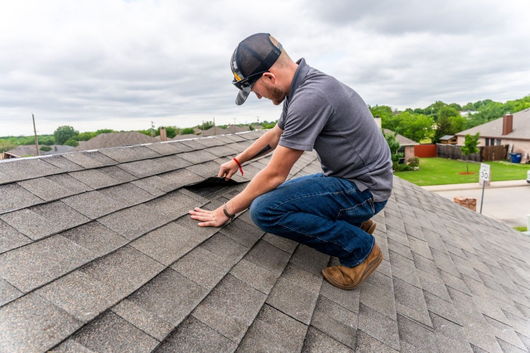 Roof problems found during a home inspection including damaged shingles and roof leaks